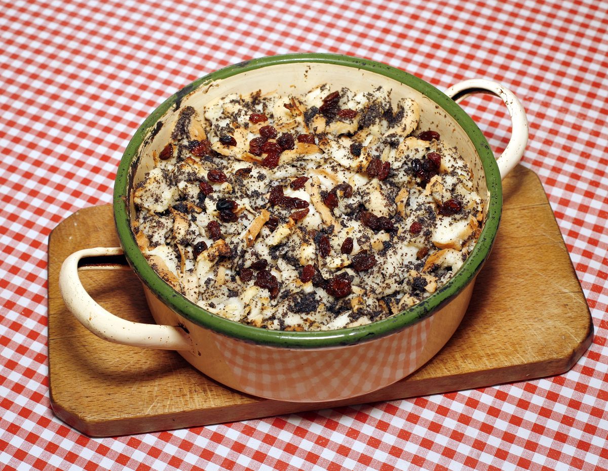 Mákos guba, bread pudding with poppy seeds, in a ceramic dish