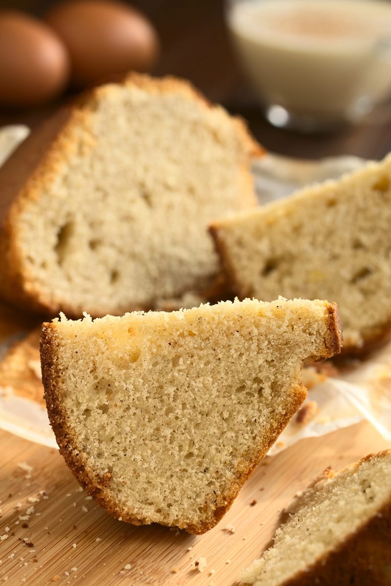 Slices of egg liqueur cake on a wooden board