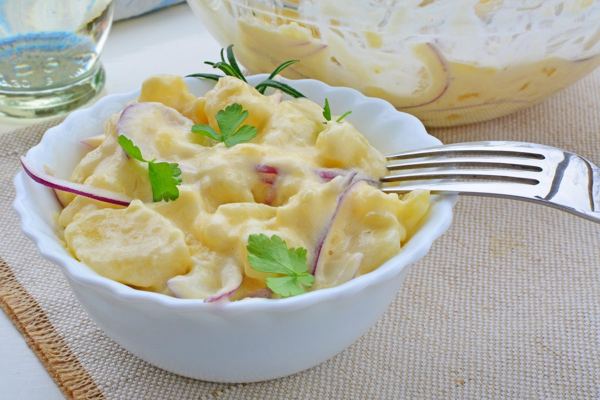 Hungarian potato salad in a white bowl