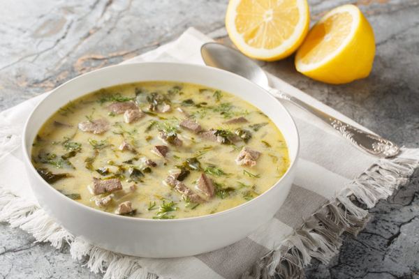 Bowl of magiritsa, Greek Easter soup with lamb, herbs and egg-lemon sauce