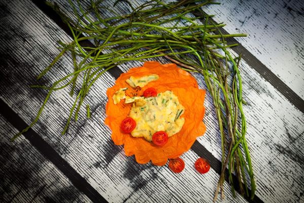 Wild asparagus omelet garnished with asparagus spears