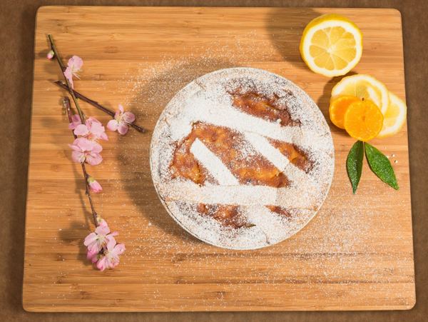 Pastiera, Neapolitan Easter wheat pie with a lattice top, dusted with sugar
