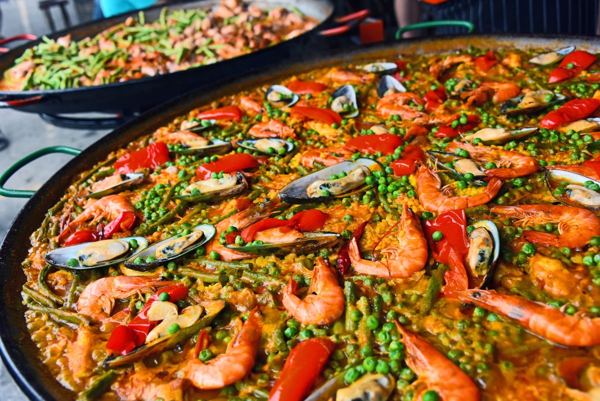 Seafood paella in a large pan