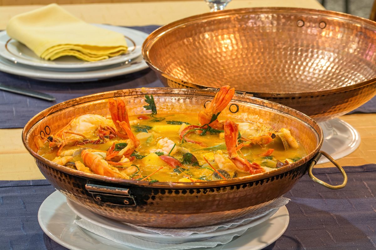 Seafood cataplana in a copper pan